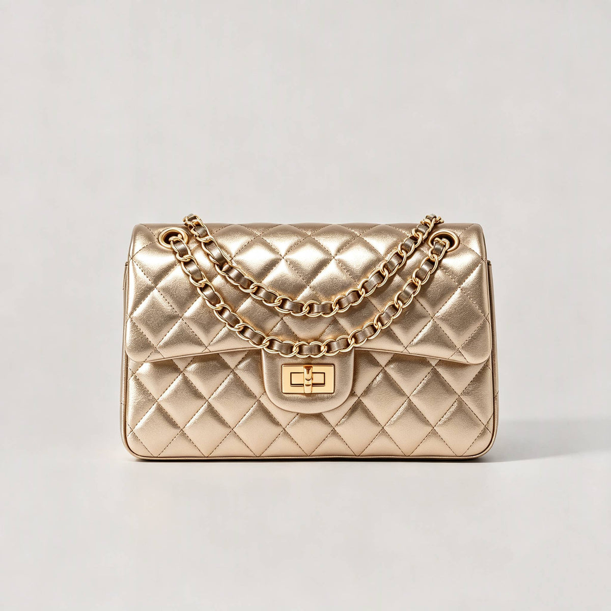 Genuine leather quilted shoulder bag with chain