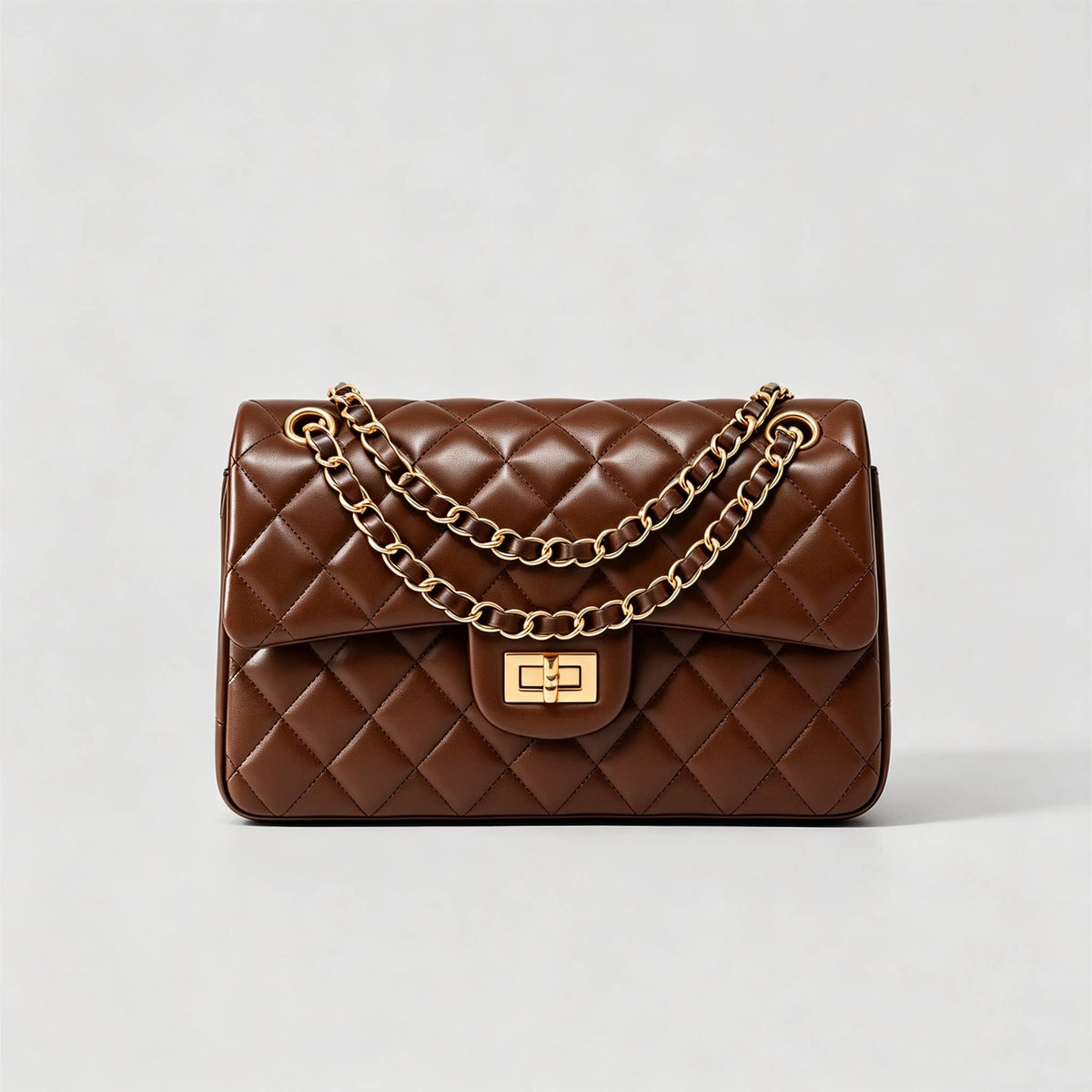 Genuine leather quilted shoulder bag with chain