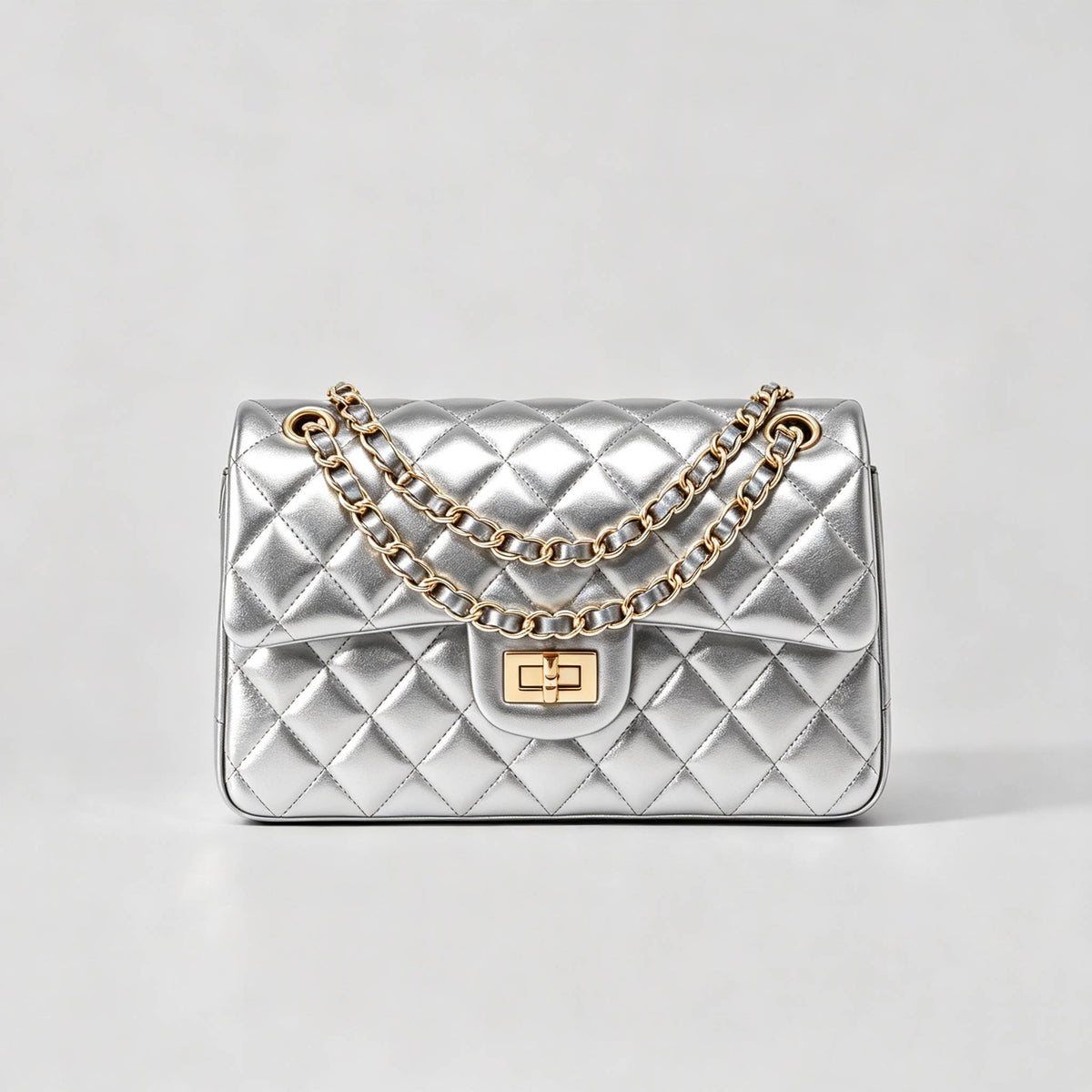 Genuine leather quilted shoulder bag with chain