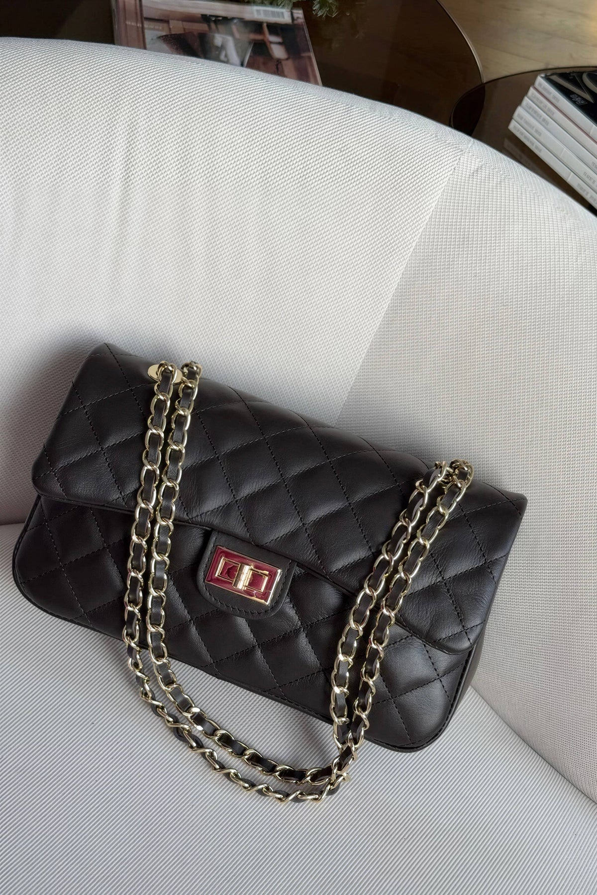 Genuine leather quilted shoulder bag with chain