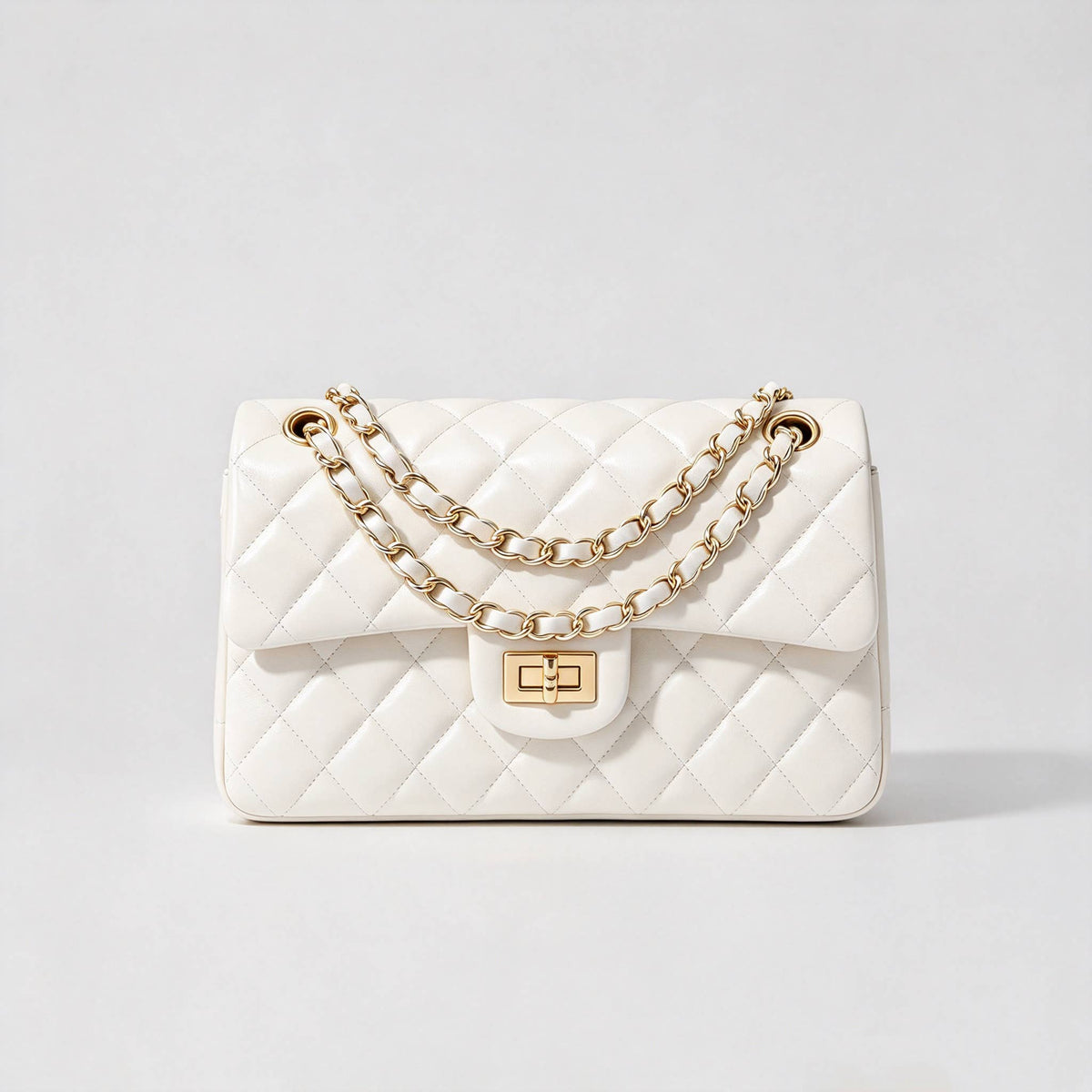Genuine leather quilted shoulder bag with chain