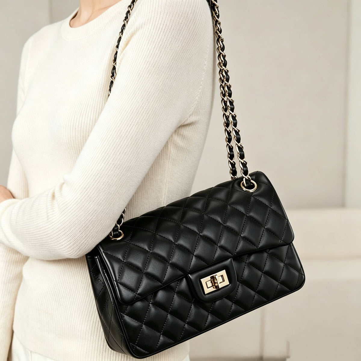 Genuine leather quilted shoulder bag with chain