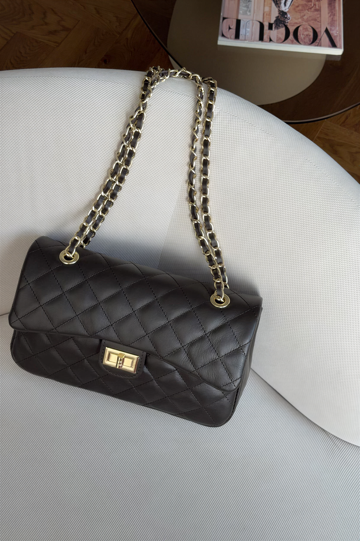 Genuine leather quilted shoulder bag with chain