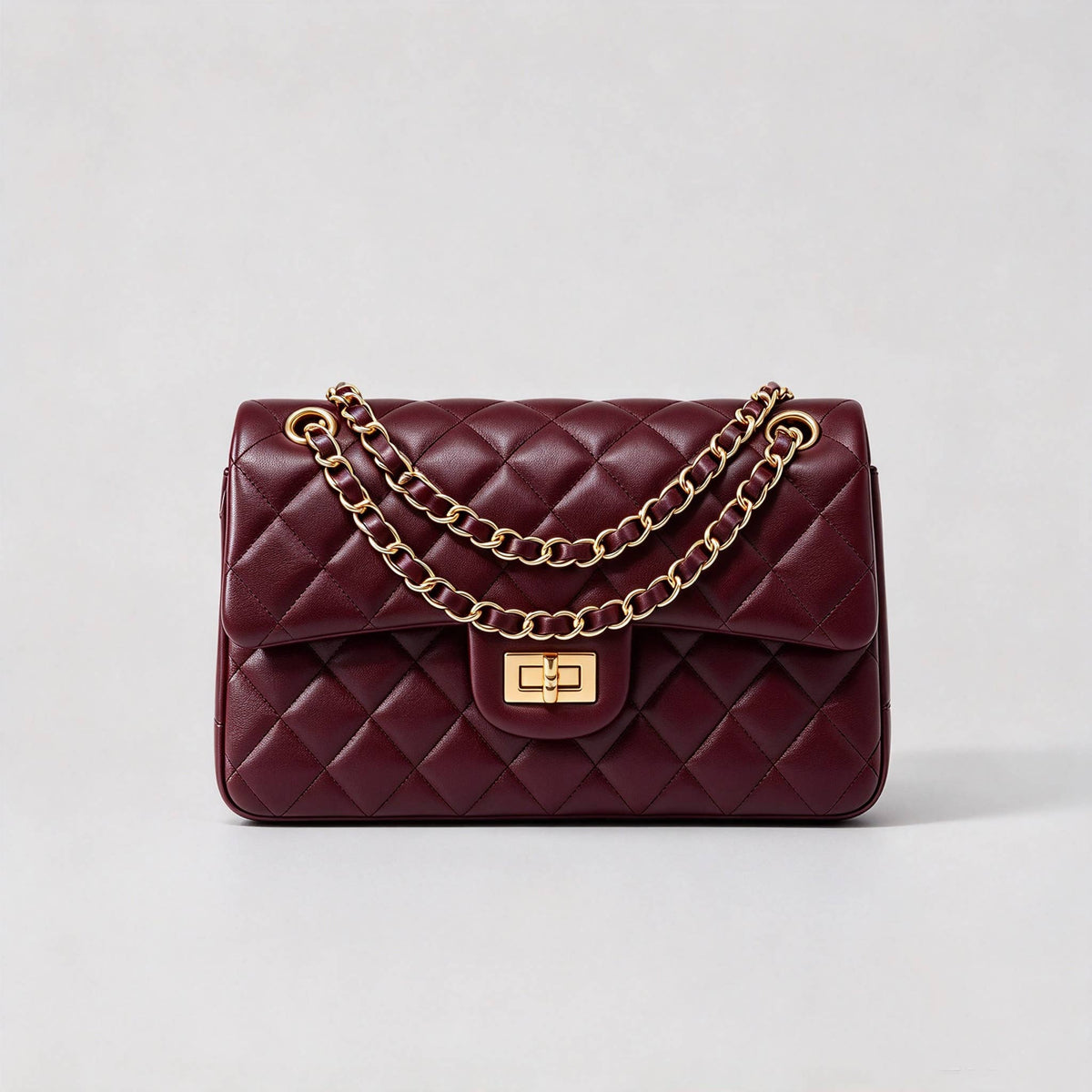 Genuine leather quilted shoulder bag with chain