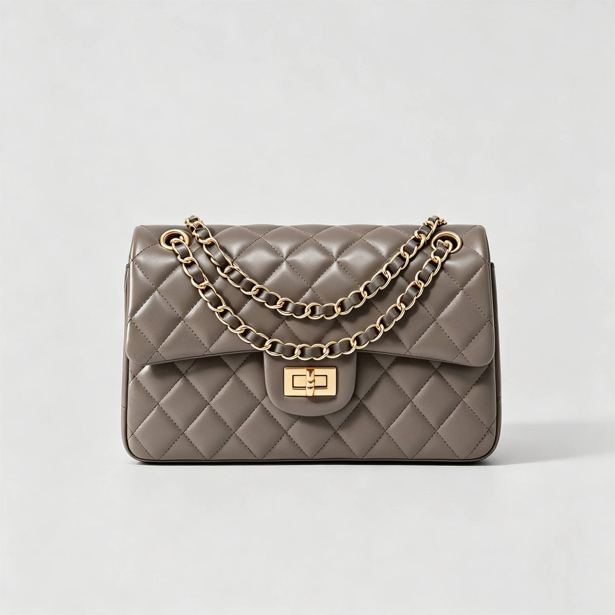 Genuine leather quilted shoulder bag with chain